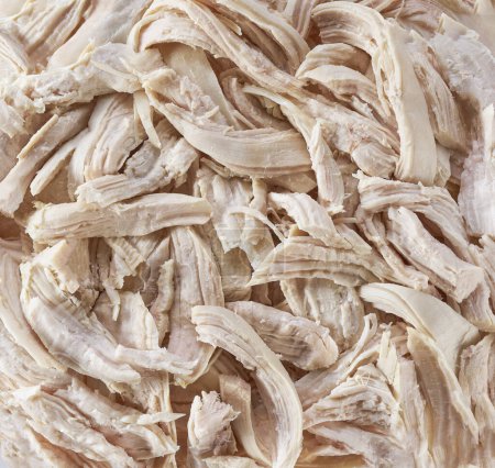 Photo for Boiled shredded chicken meat textured, close up. - Royalty Free Image