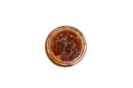 Photo for Open jar of fig jam isolated on white background, top view. - Royalty Free Image