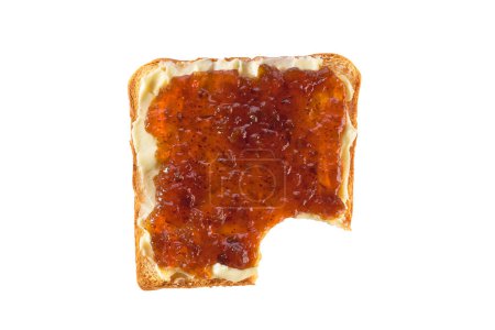 Photo for Take a bite toasted bread with figs jam and butter, isolated on a white. Top view . Slice of toast with bite missing. - Royalty Free Image