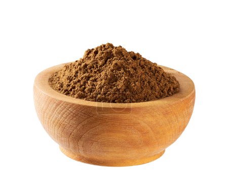 Photo for Organic cinnamon powder in a wooden bowl isolated on a white background. Aromatic spices. - Royalty Free Image