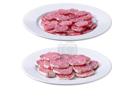Photo for Spicy pork fermented dry cured salami sausages cut in slices on a white ceramic plate, isolated on a white background. - Royalty Free Image