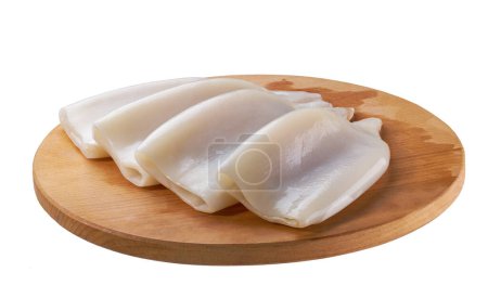 Photo for Fresh raw squid or cuttlefish fillet on cutting board isolated on a white background. - Royalty Free Image