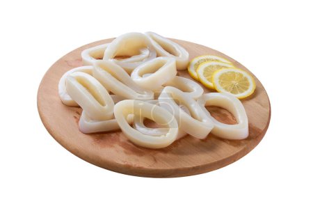 Photo for Fresh squid rings on a cutting board isolated on a white background - Royalty Free Image