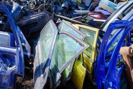 Photo for Car scrap yard, large amount of car doors for recycling. - Royalty Free Image