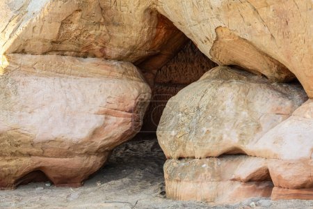 Photo for Ancient carvings on weathered rocks at a historical site. Veczemju cliffs, Latvia - Royalty Free Image