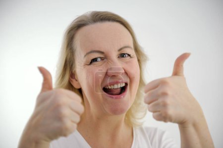 cheerful happy woman showing 2 thumbs up on two hands class like positive emotions joy good offer buy sale advertising training banner for billboard