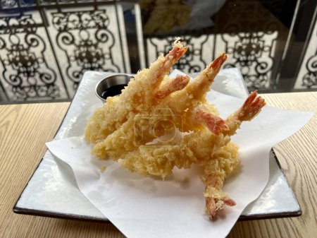 Photo for Fried shrimps or prawns sauce Fried Shrimp in batter on plates with lemon - Royalty Free Image