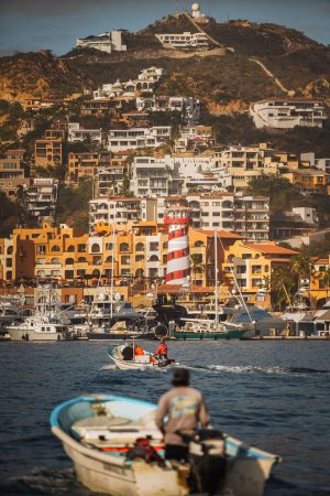 Photo for Fishing boat entering busy marina. Mexican fishing boat. Cabo San Lucas. High quality photo - Royalty Free Image