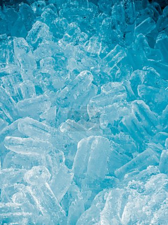 Photo for Icecubes background,icecubes texture icecubes wallpaper,ice helps to feel refreshed and ice helps the water to relax,made for advertising business of various bans,making ice,drinks or refreshments. - Royalty Free Image