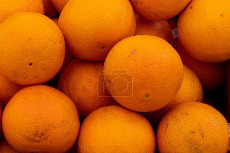 Téléchargez les photos : Background with stack of tangelo oranges. - en image libre de droit