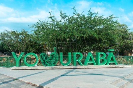 Photo for Uraba, Antioquia, Colombia. March 23. 2023: I love Uraba touristic signboard and blue sky. - Royalty Free Image