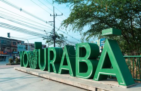 Photo for Uraba, Antioquia, Colombia. March 23. 2023: I love Uraba touristic signboard and blue sky. - Royalty Free Image