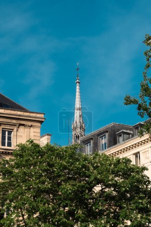 Photo for Paris, France. April 24, 2022: Spire cathedral notre dame paris and blue sky. - Royalty Free Image
