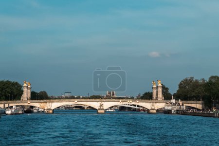 Photo for Paris, France. April 22, 2022: Famous Alexander III Bridge with beautiful blue sky. - Royalty Free Image