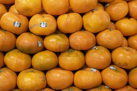 Téléchargez les photos : Medellin, Antioquia, Colombie. 4 février 2019 : Fond avec pile de mandarines. - en image libre de droit