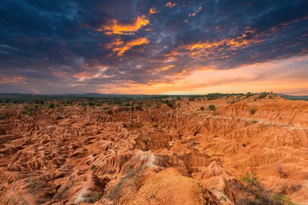 Beautiful landscape with colorful sunset in red desert. Tatacoa Desert, Huila, Colombia.