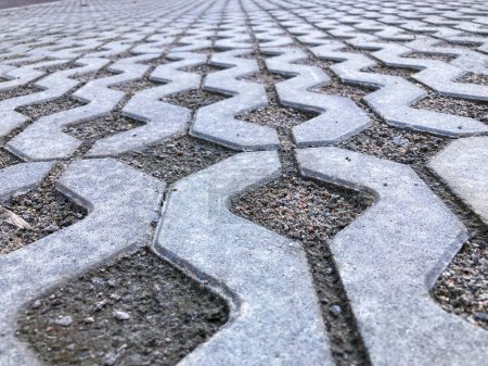 Téléchargez les photos : Grass eco pavement of a parking lot. New concrete paving texture seamless - en image libre de droit