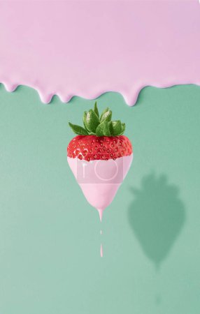 Photo for Strawberry dripping with pink paint on pink and green background. minimal idea food. - Royalty Free Image