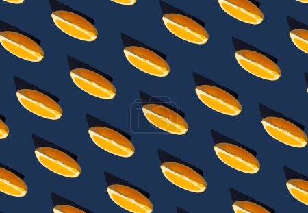 Photo for Flat lay pattern with summer orange fruit on blue background. Minimal concept with sharp shadows. Trendy social mockup or wallpaper. - Royalty Free Image