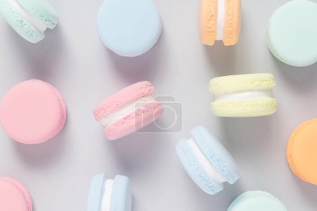 Photo for Colorful macaroons on a gray background. Flat bed. - Royalty Free Image