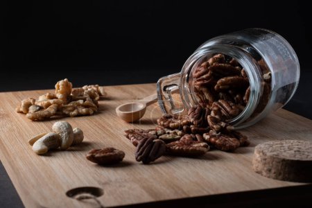 pecan nuts on wooden background food photography international pecan day