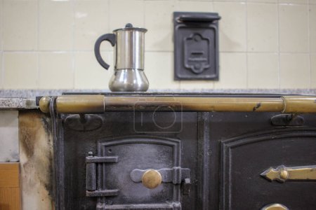 Photo for Old-Fashioned Brew: Coffee Percolating on a Wood Stove - Royalty Free Image