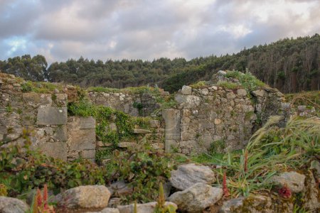 San Tirso ruins in Xove, Spain during a cloudy sunset