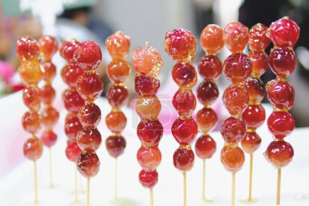 Photo for Beautifully arranged sugar-coated grapes. Tang Hu Lu - Royalty Free Image