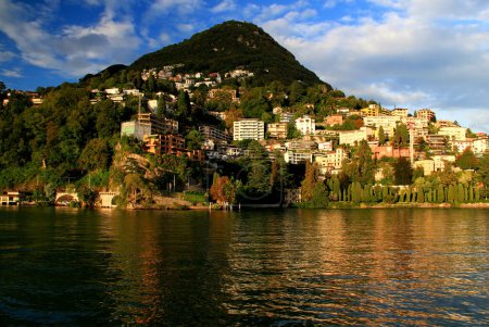 Photo for Landscape with a view of a hill with houses and Lake Lugano in the city of Lugano, in southern Switzerland - Royalty Free Image