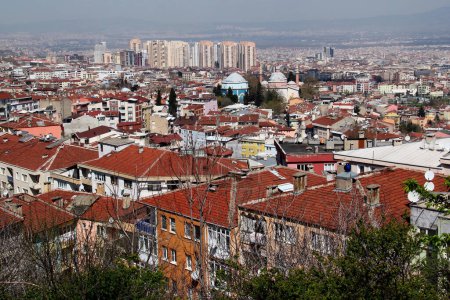 Photo for A panoramic view of the city of Bursa (Turkiye) with many mosques and a Green Tomb in the center of the photo - Royalty Free Image