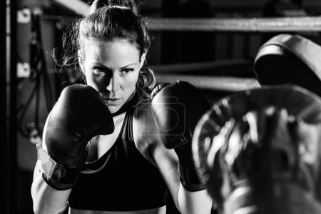 Photo for Women on boxing training - Royalty Free Image