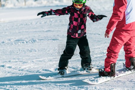 Photo for Boy and Instructor on Snowboarding Class - Royalty Free Image