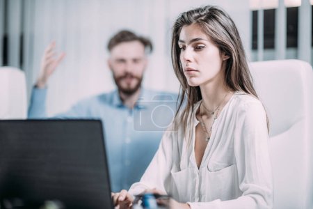 Photo for Mobbing at Work. Scared Young Female Employee in the modern office.  Working under pressure. - Royalty Free Image