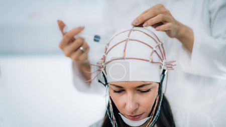 Photo for Brainwave EEG or Electroencephalograph Examination in a Clinic - Royalty Free Image