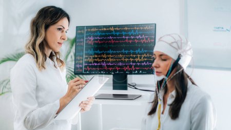 Photo for Female Patient in a Neurology Lab doing EEG Scan - Royalty Free Image