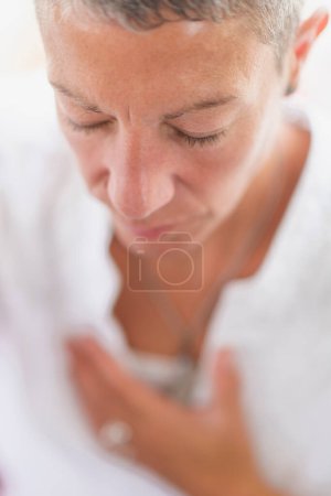 Photo for Mindful woman meditating, developing intuition - Royalty Free Image