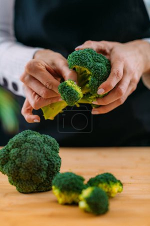 Photo for Close-up Image of fresh organic broccoli, superfood rich in vitamin K, vitamin C, folic acid, potassium, phytonutrients and fibers - Royalty Free Image