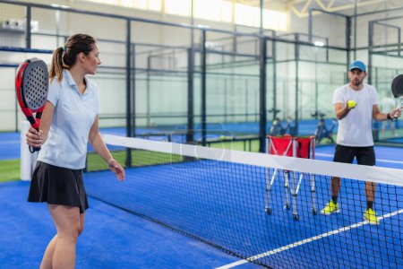 Photo for Tailored indoor padel coaching. - Royalty Free Image
