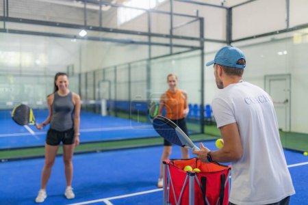Photo for Indoor Padel Training. Personalized Sessions for Two Players - Royalty Free Image