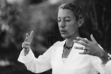 Photo for Spiritual Coach Sending Positive Thoughts Hand Gesture - Royalty Free Image