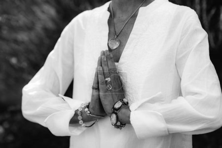 Photo for Female hands in prayer position outdoor. Self-care practice for wellbeing - Royalty Free Image