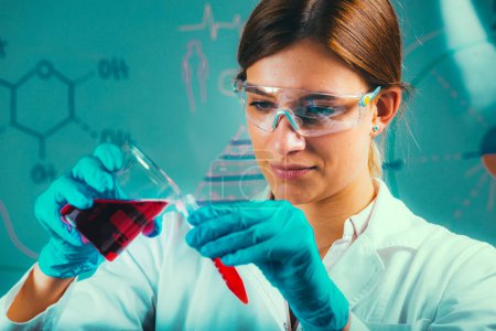 Photo for Biotechnology. Female scientist working in laboratory - Royalty Free Image
