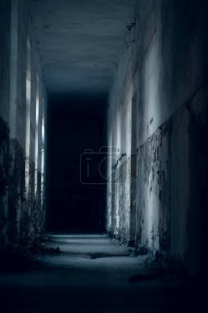 Photo for Beauty of decay - dark endless corridor of old abandoned building - Royalty Free Image