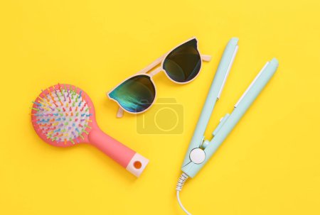 Photo for Women's accessories on a yellow background. Hair care. Top view. Flat lay - Royalty Free Image