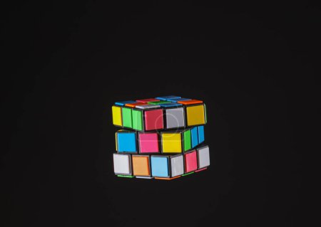Photo for ODESSA, UKRAINE - JANUARY 24, 2022: Rubik's cube isolated on black background - Royalty Free Image