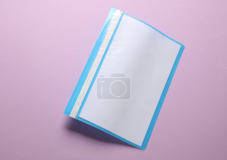 Plastic folder with paper sheets on a purple background. Business mockup