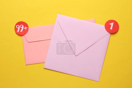 Envelopes with notification icons on yellow background