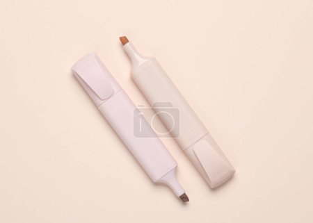 Photo for Markers or colored felt-tip pens on beige pastel background. Creative layout - Royalty Free Image