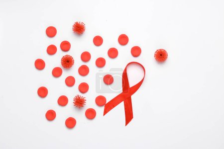 Photo for Red blood cells model with virus molecules and aids awareness ribbon on white background - Royalty Free Image