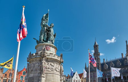 Photo for Bruges, Belgium, the monument to the Leaders of the Flamish Resistence in Market square - Royalty Free Image